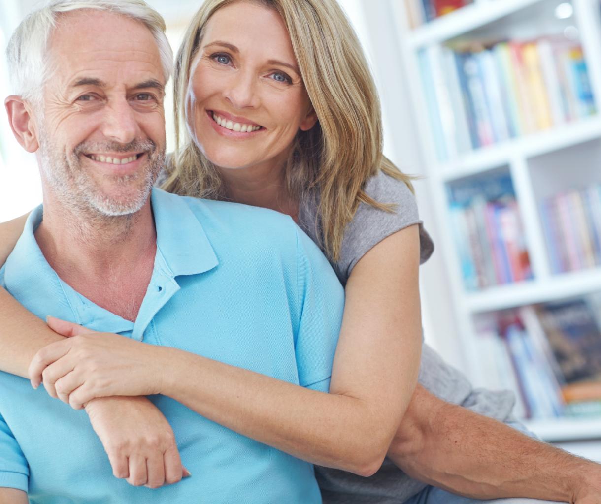 Senior couple, happy and portrait in their home with love, care and support.
